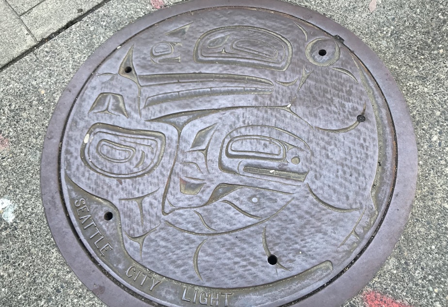 caption: Utility cover plate, downtown Seattle