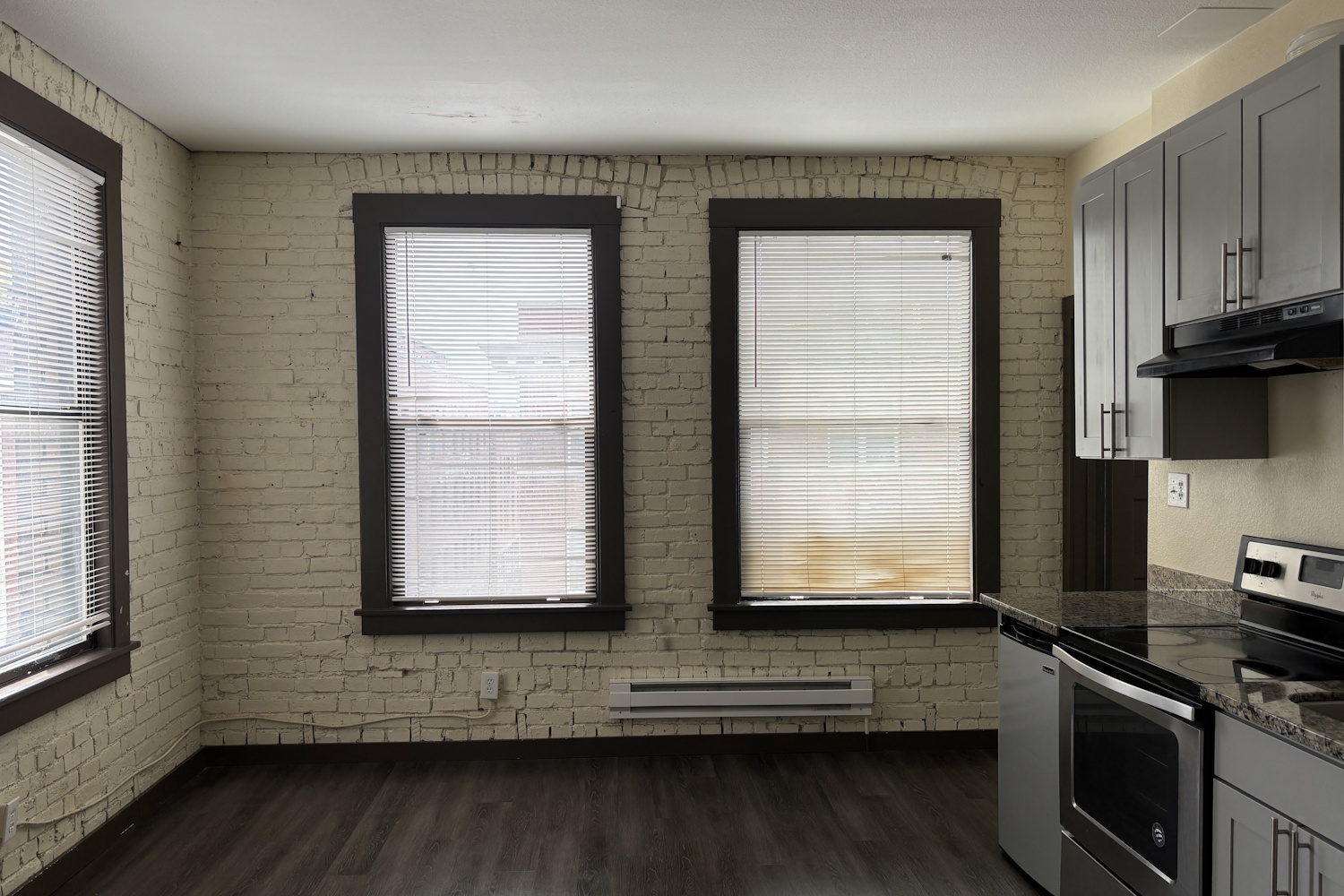 caption: A modest brick studio in Seattle's Chinatown International District.