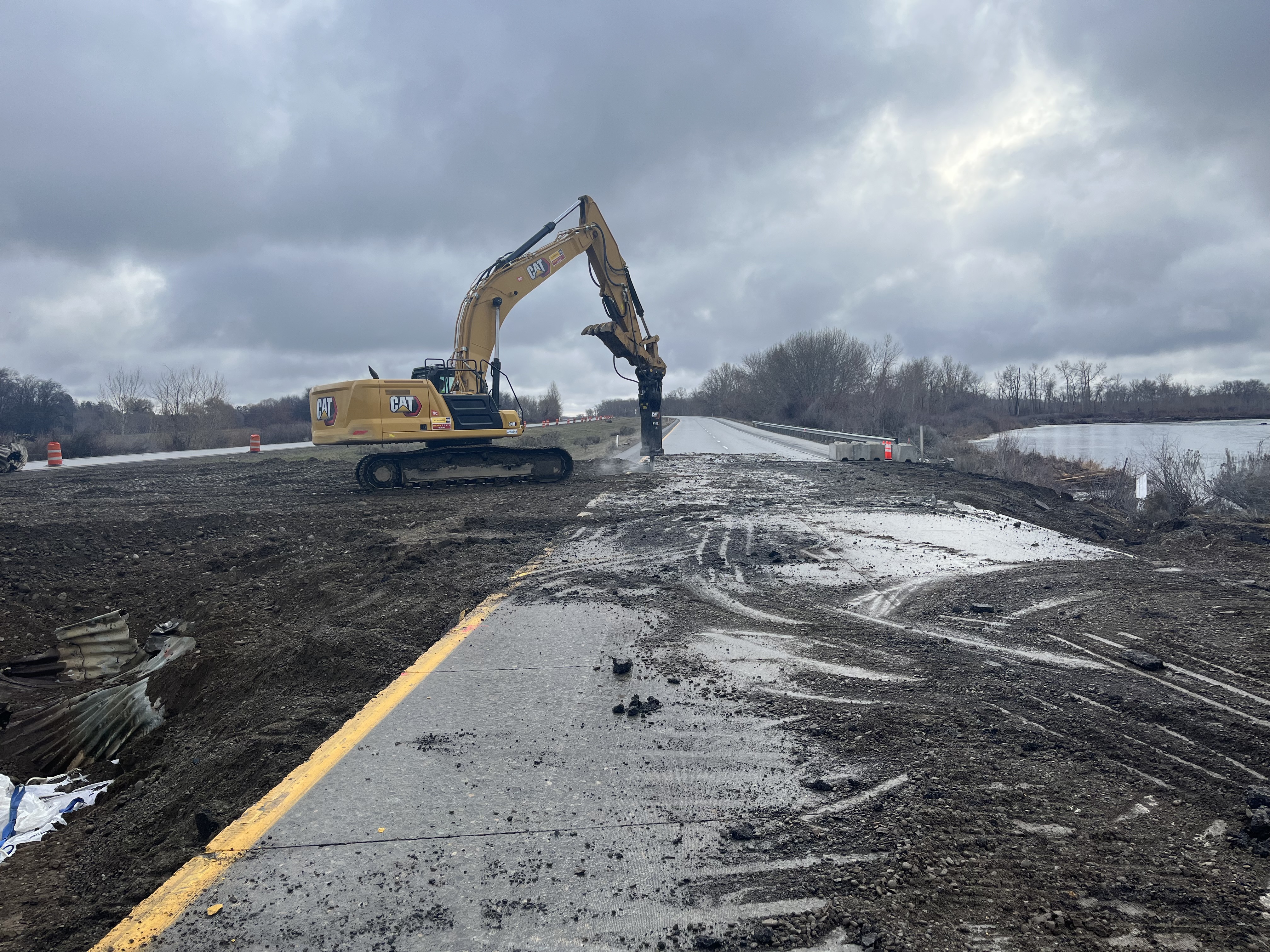 caption:  Contractor crews working to remove more of the eastbound lane concrete panels.