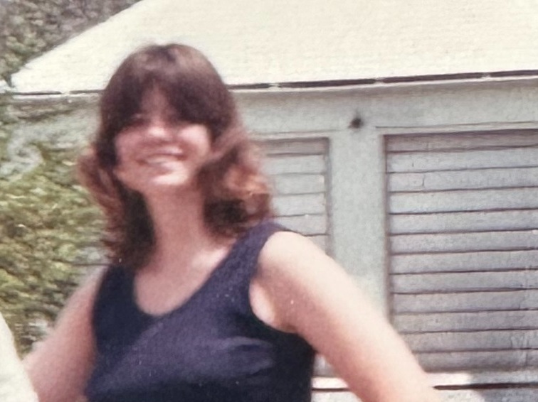 caption: Denise Elliott at 16 at the Bahamas home where her family was staying.