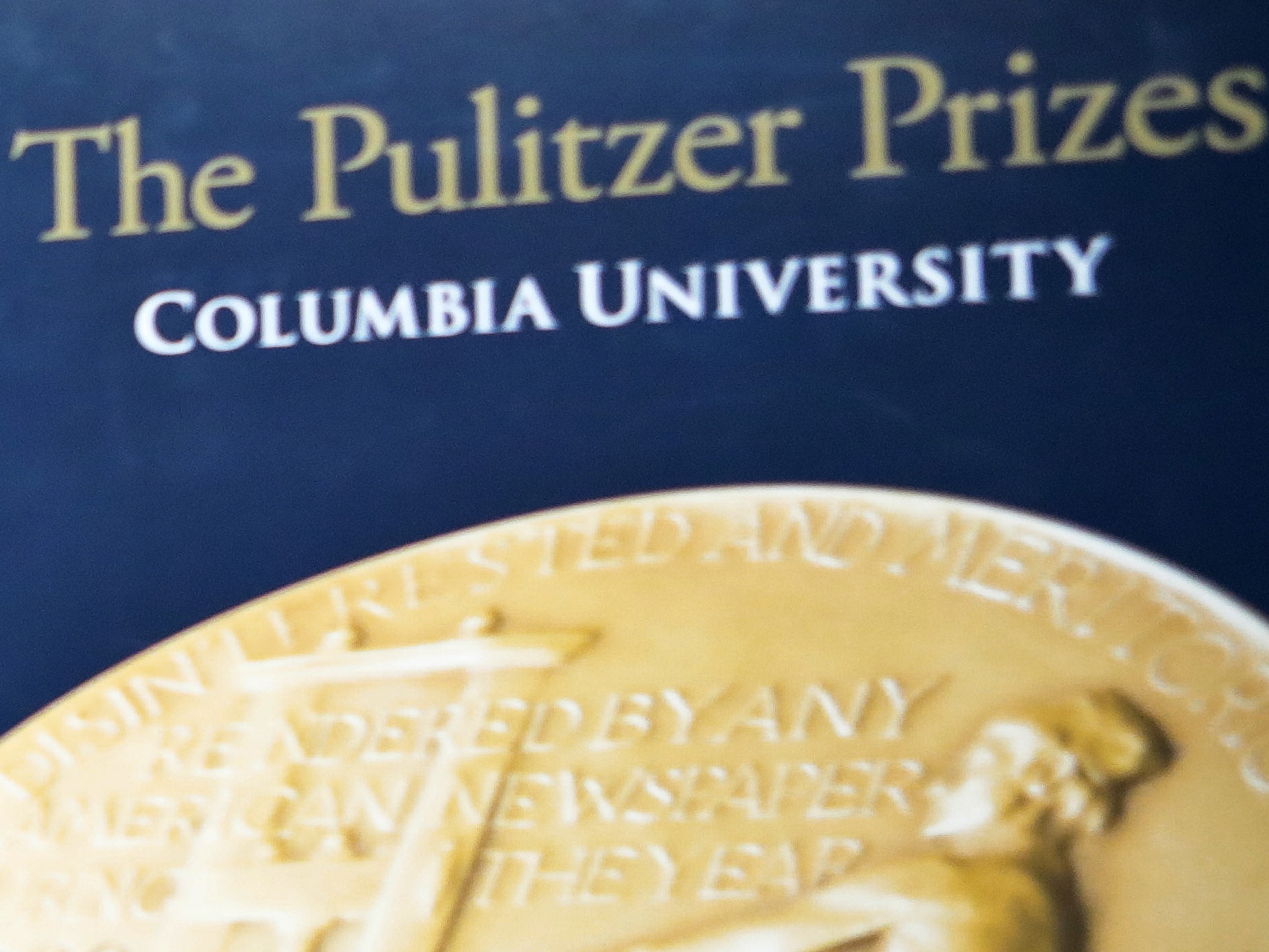 caption: Signage for The Pulitzer Prizes appear at Columbia University on May 28, 2019, in New York.