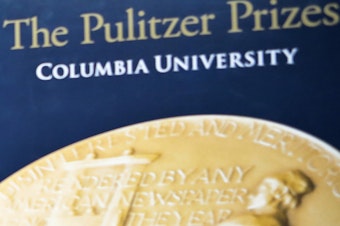 caption: Signage for The Pulitzer Prizes appear at Columbia University on May 28, 2019, in New York.