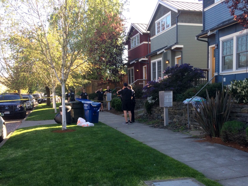 caption: The white garbage bags contained what appeared to be human remains. It was found by a resident on the 1600 block of 21st Avenue in Seattle's Central District.