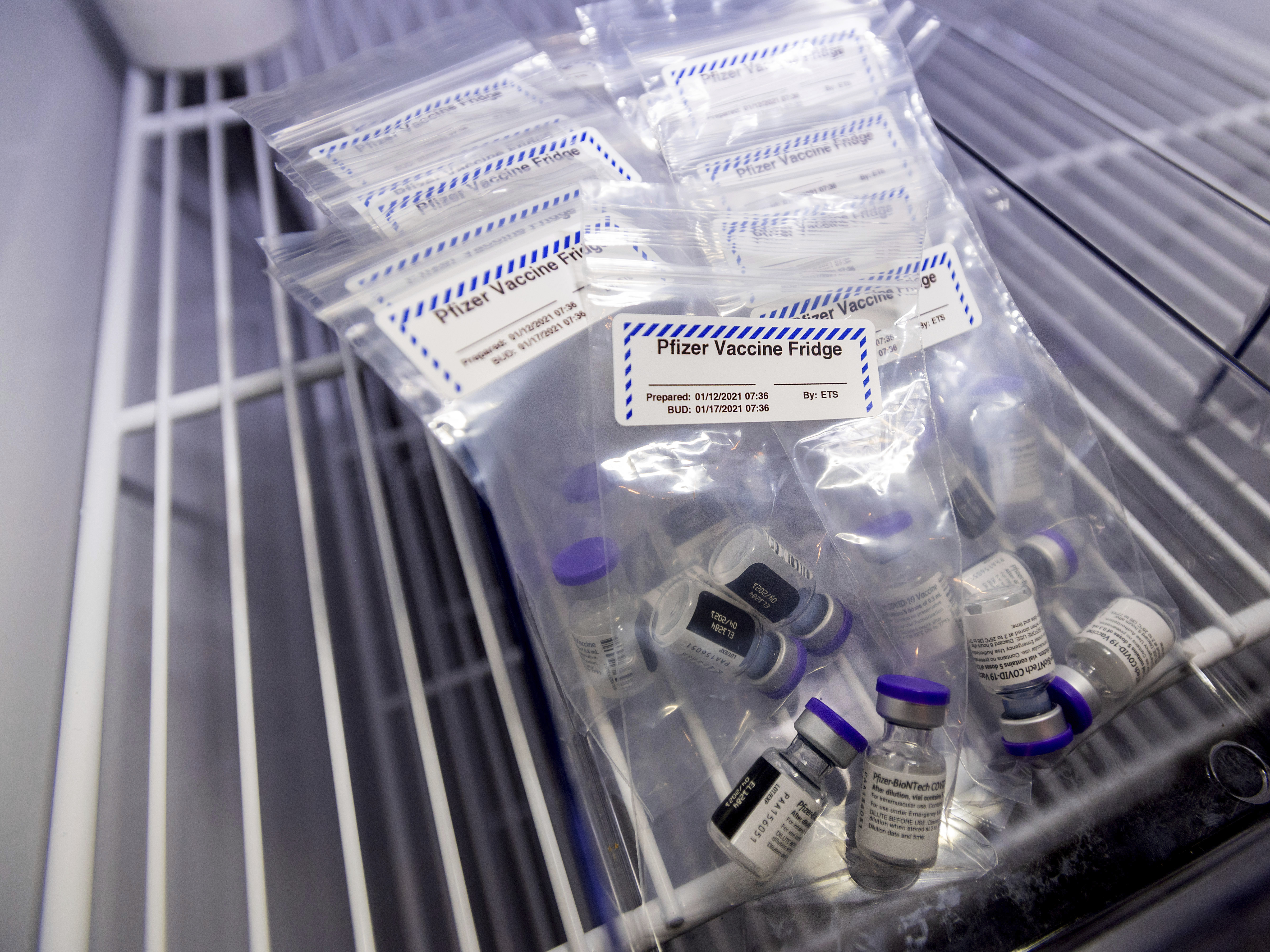 caption: The Pfizer-BioNTech COVID-19 vaccine, like the Moderna version, requires storage in extremely frigid temperatures before its thawed out for use.