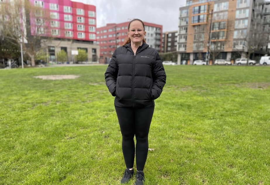 caption: Mimi Martin, in a park near the downtown Seattle Amazon Go store where she works