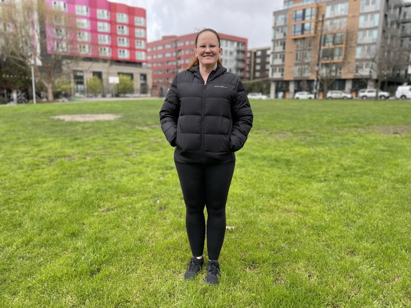 caption: Mimi Martin, in a park near the downtown Seattle Amazon Go store where she works