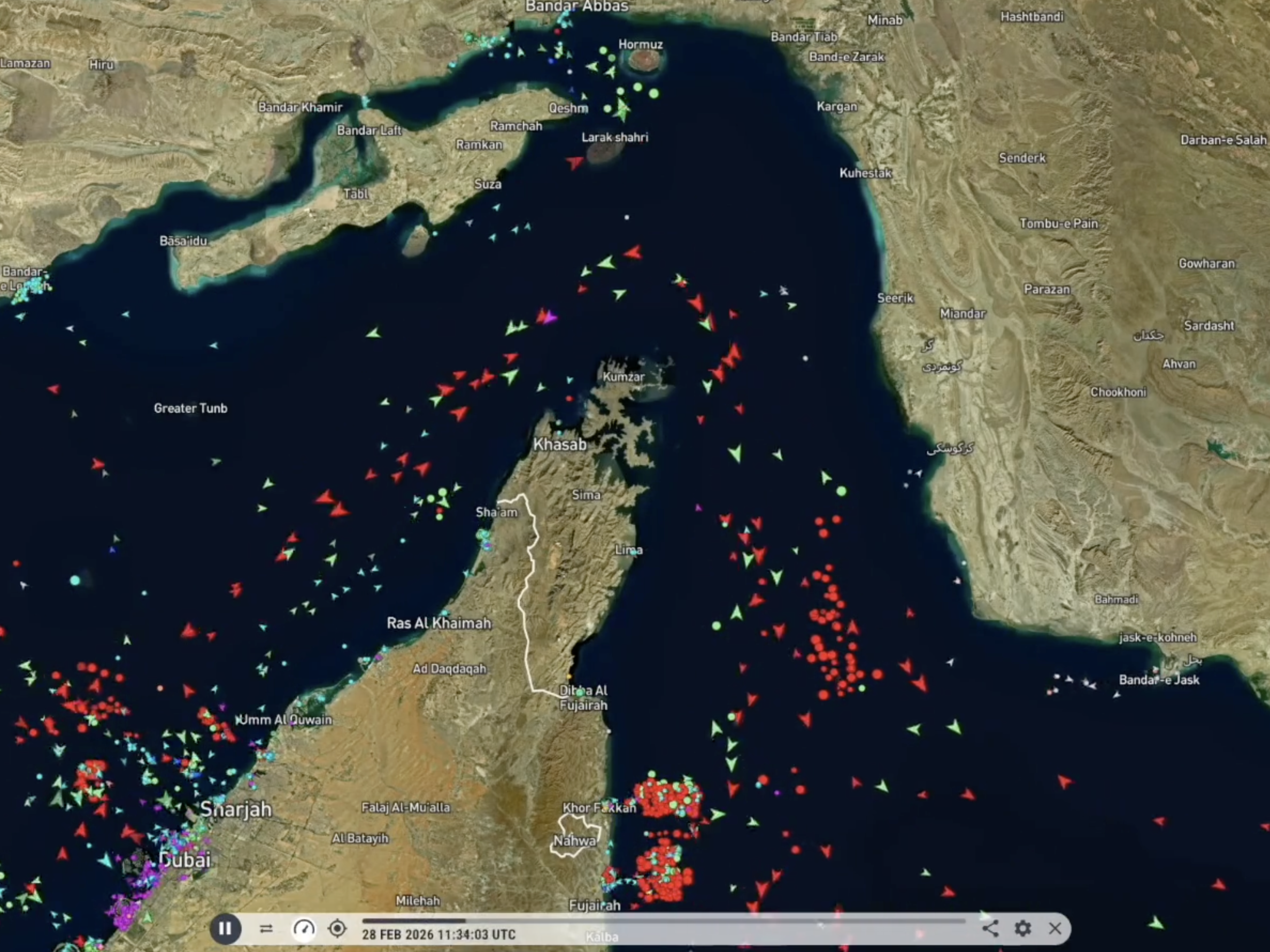caption: A map from tracking site MarineTraffic shows ship traffic through the Strait of Hormuz.
