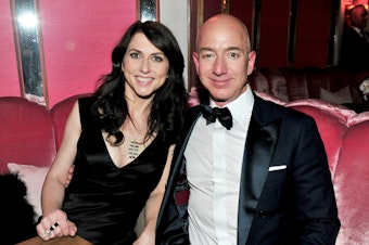 caption: MacKenzie Scott with her then-husband, Amazon founder Jeff Bezos, in 2017.
