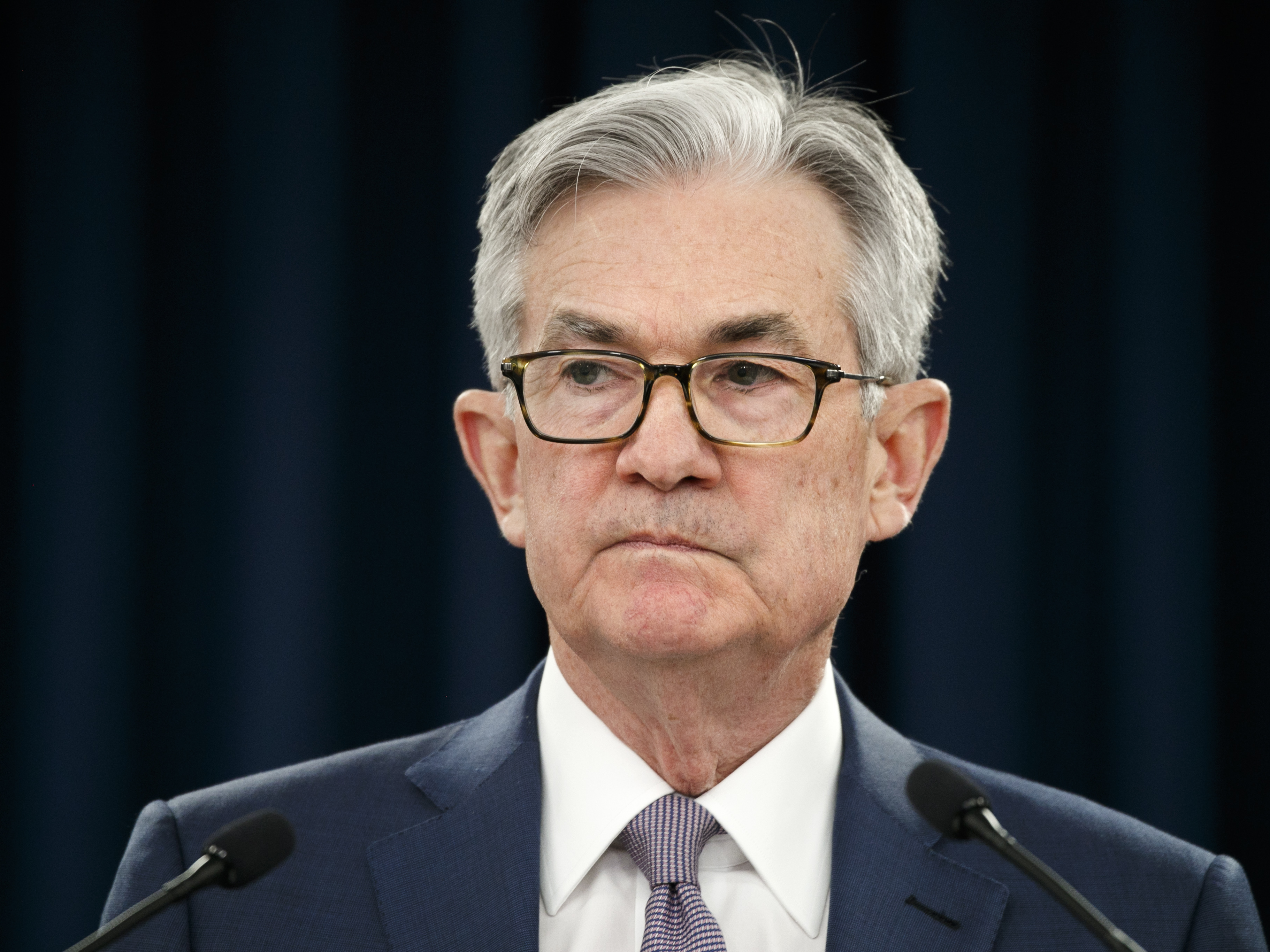 caption: Federal Reserve Chairman Jerome Powell pauses during a news conference in Washington earlier this month. The Fed announced late Wednesday a new lending facility to back money market mutual funds battered by the coronavirus crisis.