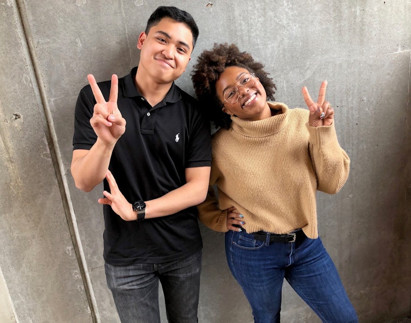 caption: Joe Santiago and Ishea Brown of KUOW's Curiosity Club pose for a photo after recording a follow-up conversation at KUOW Public Radio in Seattle. March 25, 2019. 