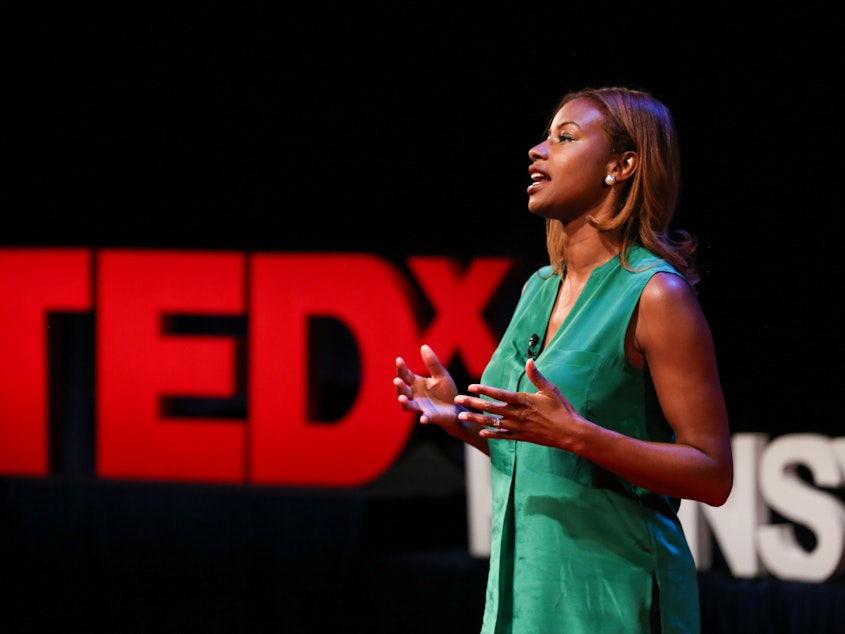 caption: Eshauna Smith on the TED stage.