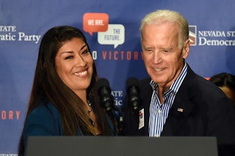 caption: Then-Democratic candidate for lieutenant governor Lucy Flores and then-Vice President Joe Biden at a rally on Nov. 1, 2014 in Las Vegas. Flores accuses Biden of acting inappropriately during that visit.