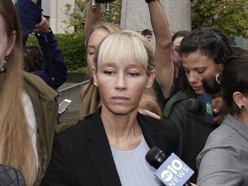 caption: Sherri Papini leaves a federal courthouse Monday after Judge William Shubb sentenced her to 18 months in federal prison for faking her own kidnapping in 2016.