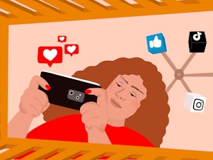 Illustration of a mother leaning over the railing of her baby's crib taking photos on her phone. Heart icons emanate from her phone and a mobile featuring icons of popular social media sites like TikTok, Instagram and Facebook hangs above her head. The image is from the baby's perspective in the crib.