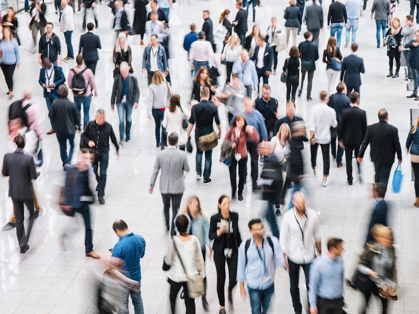 caption: Kate Klonick, assistant professor of law at St. John's University, gave her students an optional assignment for spring break: Try to identify a stranger based solely on what they reveal in public. Above, strangers commuting in London.