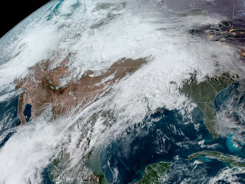 caption: "Two back to back powerful storms will produce widespread heavy snow" in parts of western and central U.S., the National Weather Service says.