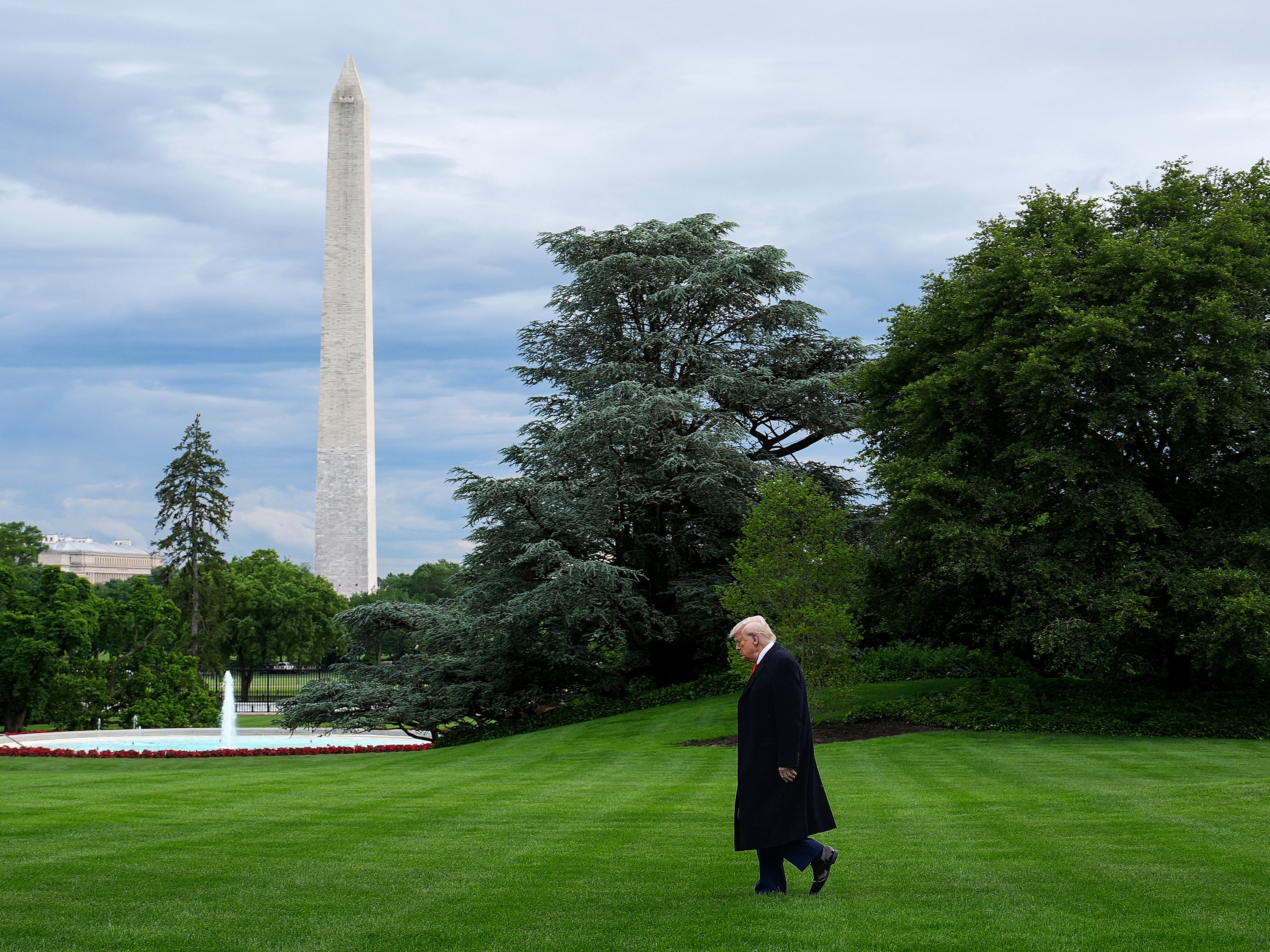 caption: President Trump departs the White House on May 22, 2025.