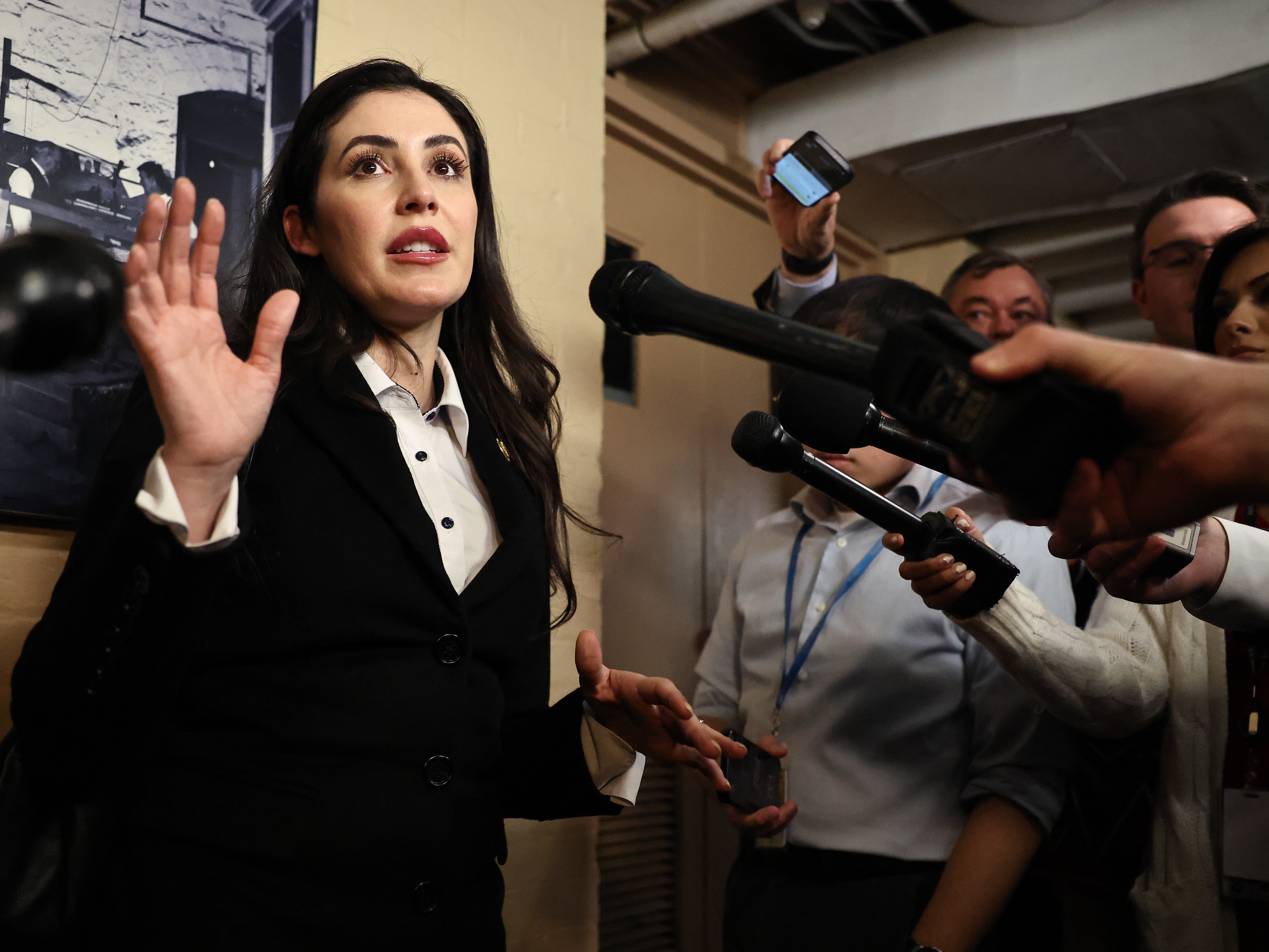 caption: Rep. Anna Paulina Luna, R-Fla., seen here at the U.S. Capitol on December 20, 2024, is working on a measure that would allow new parents to vote by proxy.