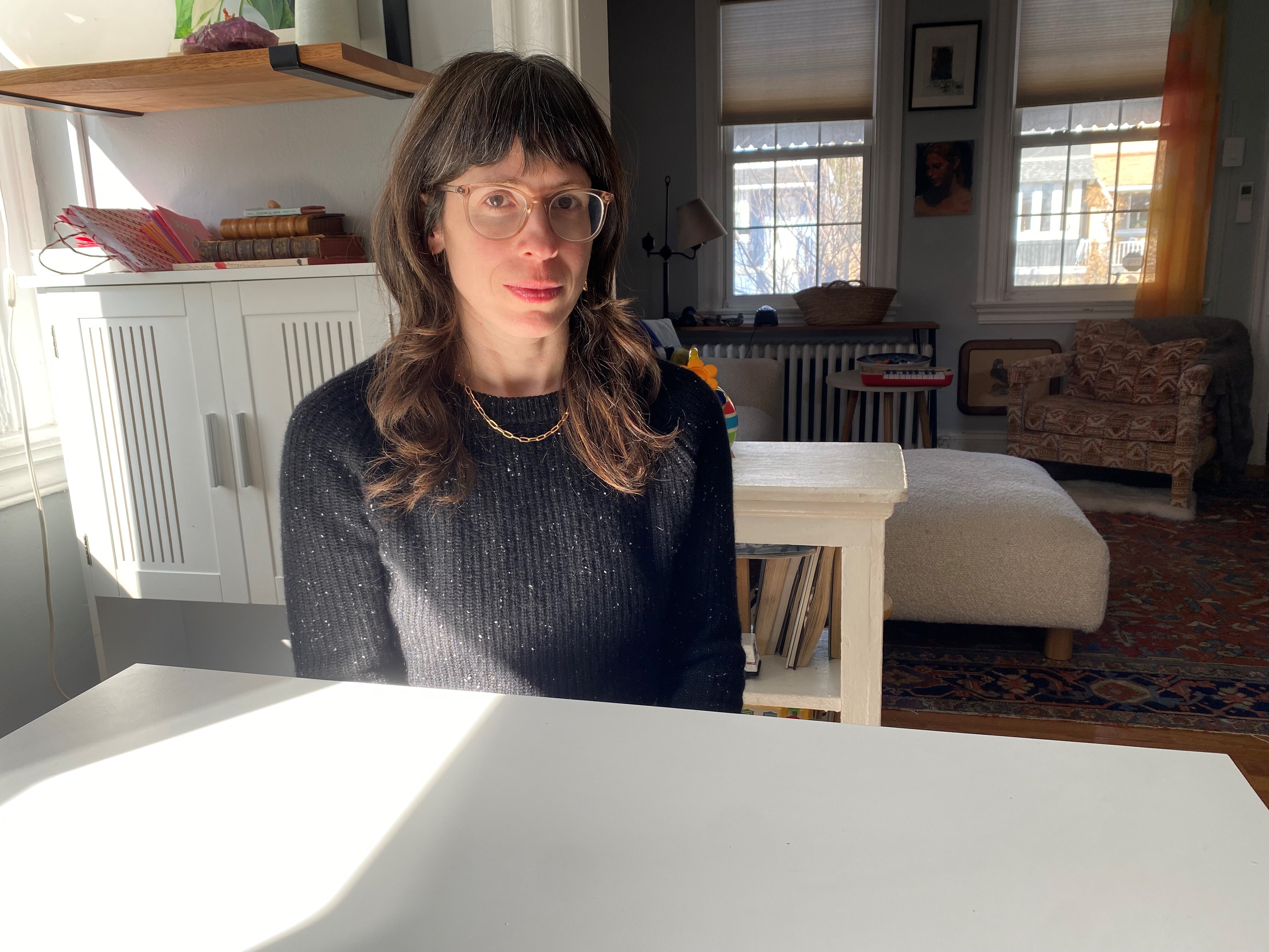 caption: Liz Goggin, a licensed clinical social worker with the Veterans Health Administration, accepted the Trump administration's deferred resignation offer before her agency said her position was exempt.