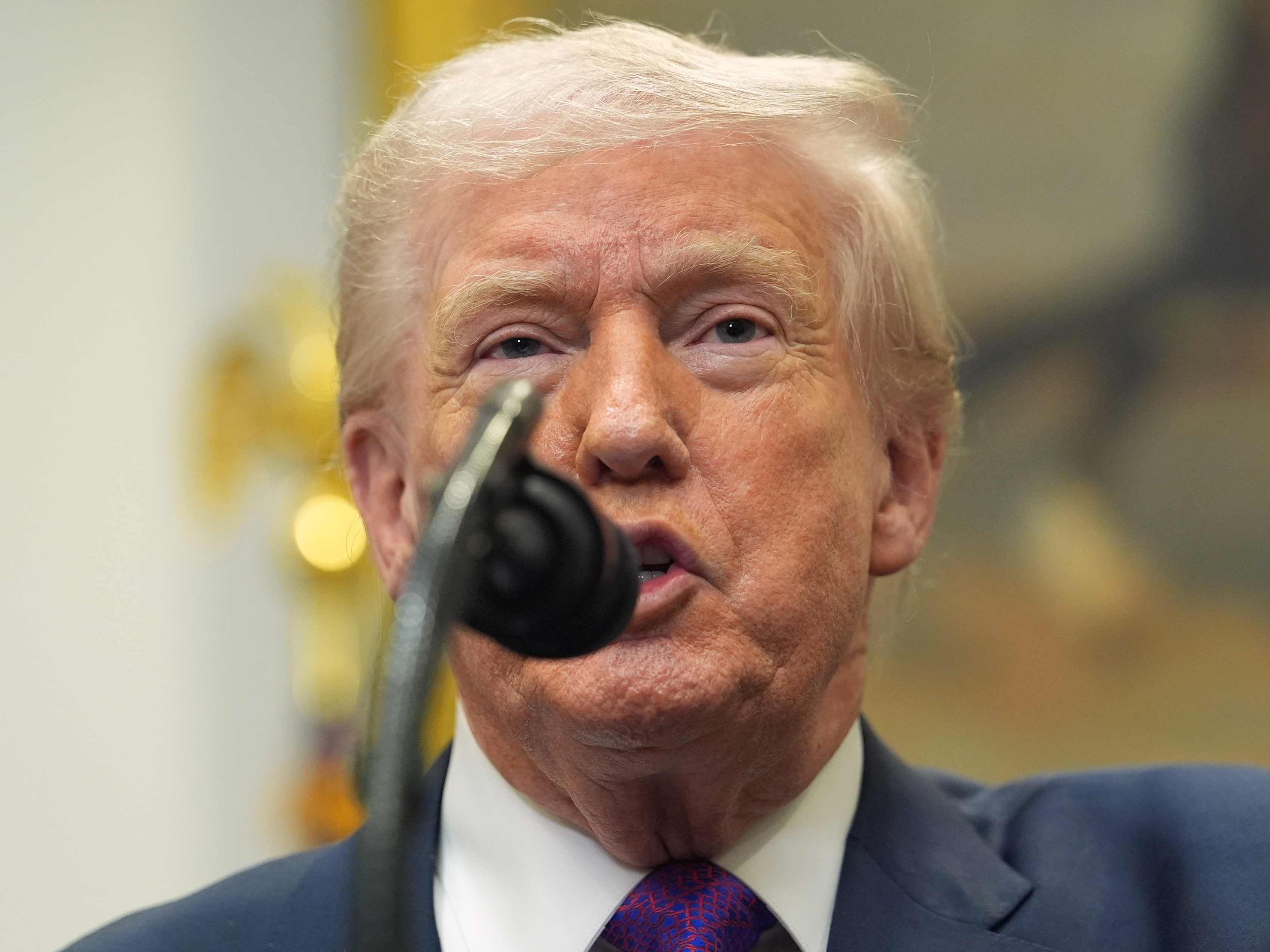 caption: President Donald Trump speaks during an event with Environmental Protection Agency director Lee Zeldin to announce the EPA will no longer regulate greenhouse gases, in the Roosevelt Room of the White House, Thursday, Feb. 12, 2026, in Washington.