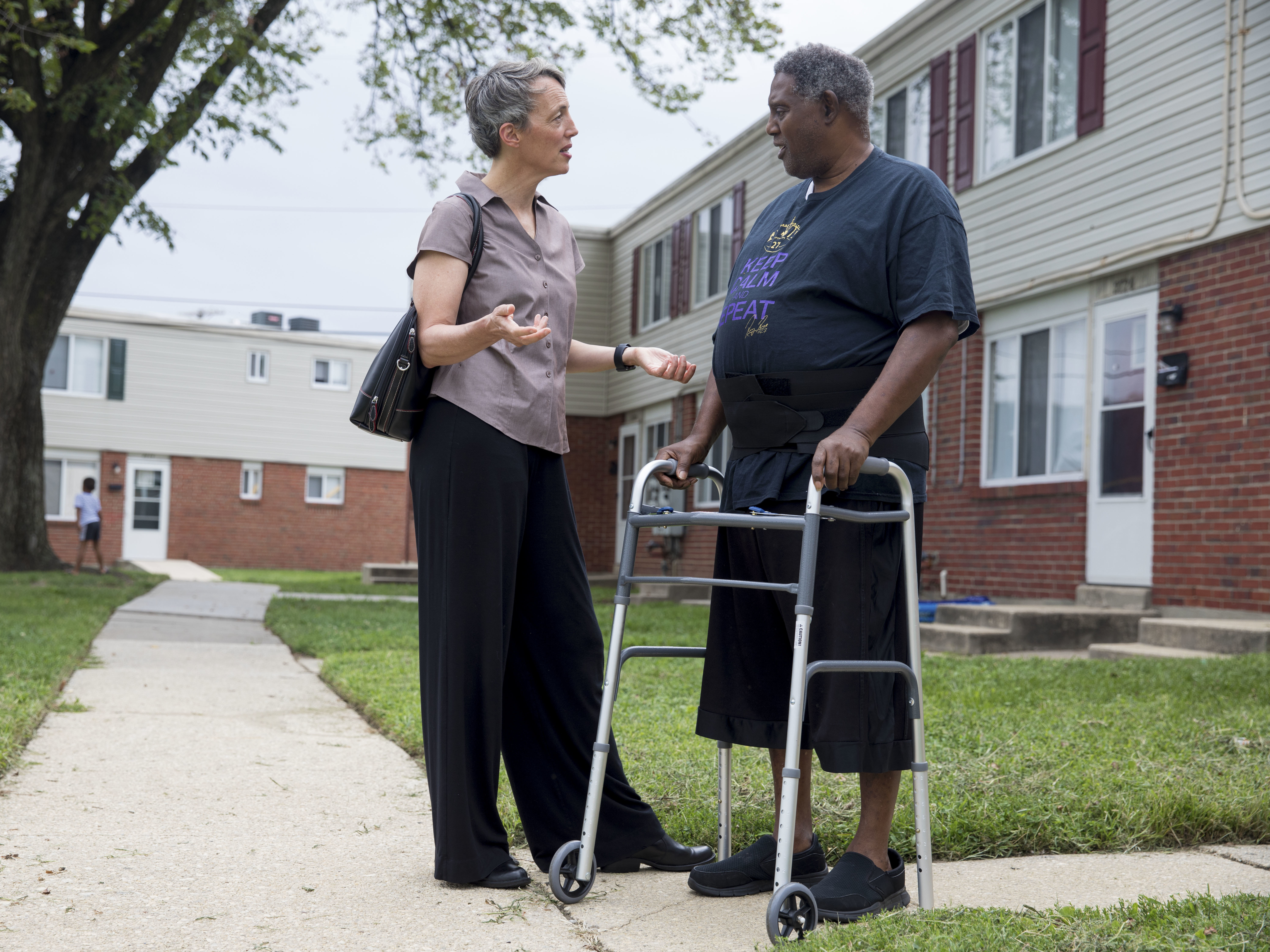 caption: The CAPABLE program provides therapy but also offers up practical solutions to help make navigating the home easier. Sarah Szanton (left) got the idea for CAPABLE when she was a nurse practitioner treating homebound seniors.