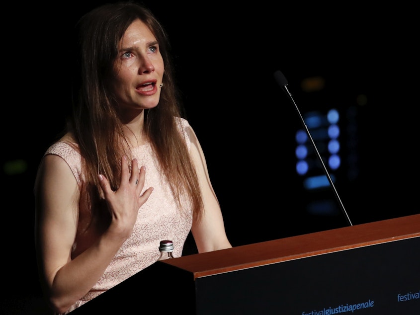 caption: Amanda Knox speaks at a Criminal Justice Festival at the University of Modena in 2019.