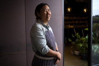caption: Rachel Yang, owner and chef of Revel, on Tuesday, October 17, 2023, in Seattle. 