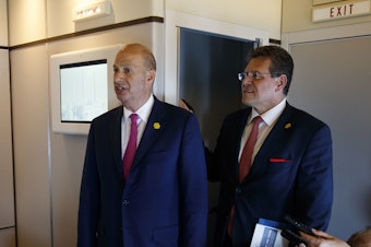 caption: Gordon Sondland, U.S. ambassador to the European Union (left), and EU Vice President Maros Sefcovic speak with reporters about trade as they travel with President Trump on May 14.