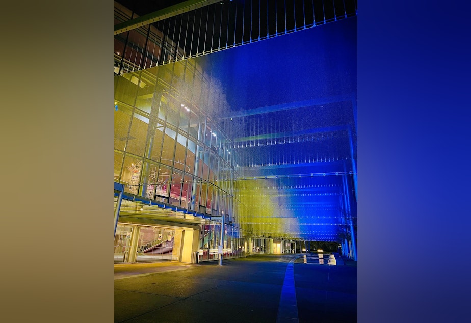 caption: McCaw Hall in Seattle, the home of the Seattle Opera and Pacific Northwest Ballet, bathed in lights the colors of Ukraine's flag