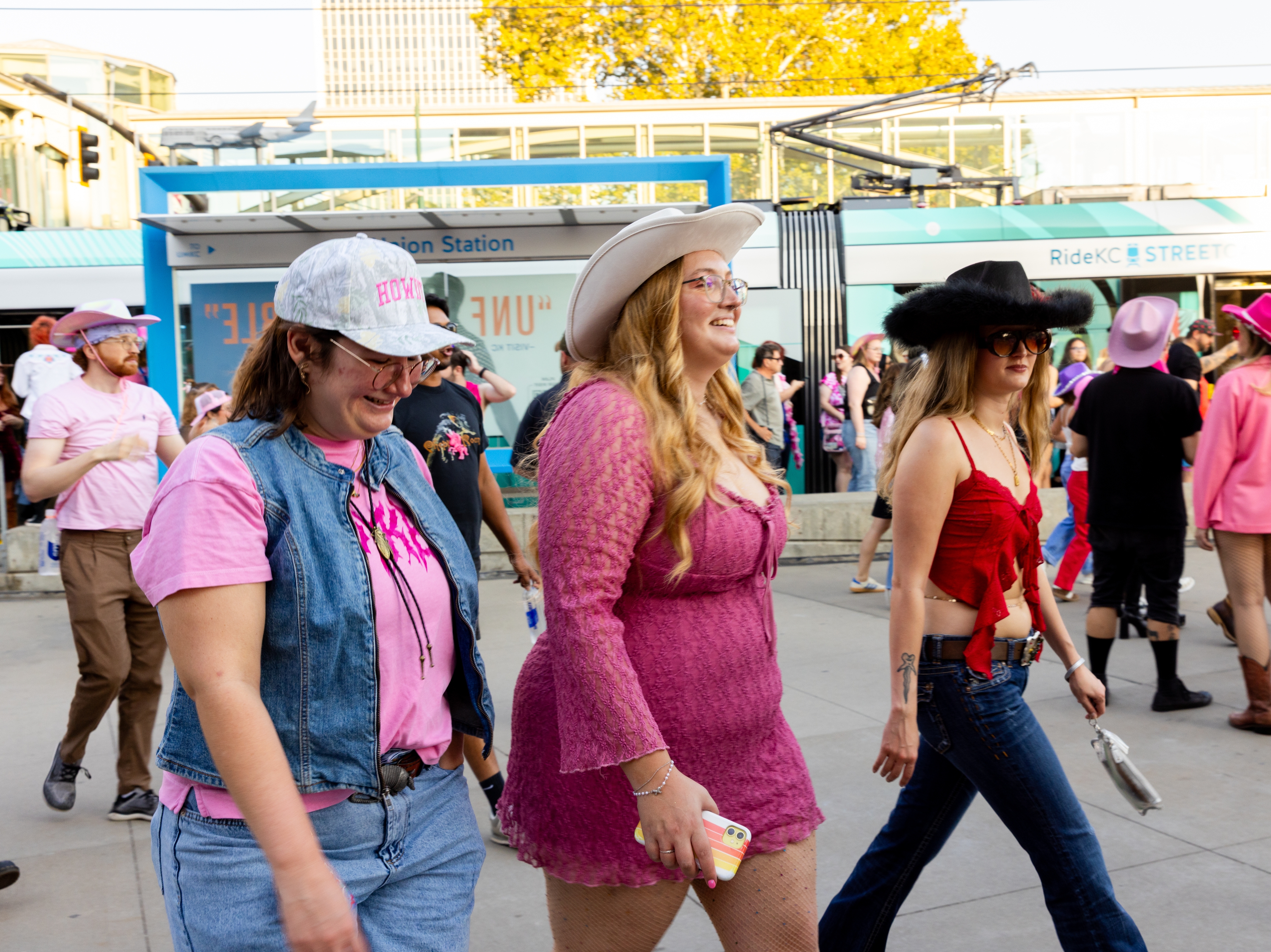 caption: Fans, many of them wearing pink and cowboy hats, get off of the streetcar at Union Station before the show. Chappell Roan, who exploded in popularity last summer, only picked three cities on her recent pop-up American tour: New York City, Los Angeles and Kansas City, which is in her home state of Missouri.