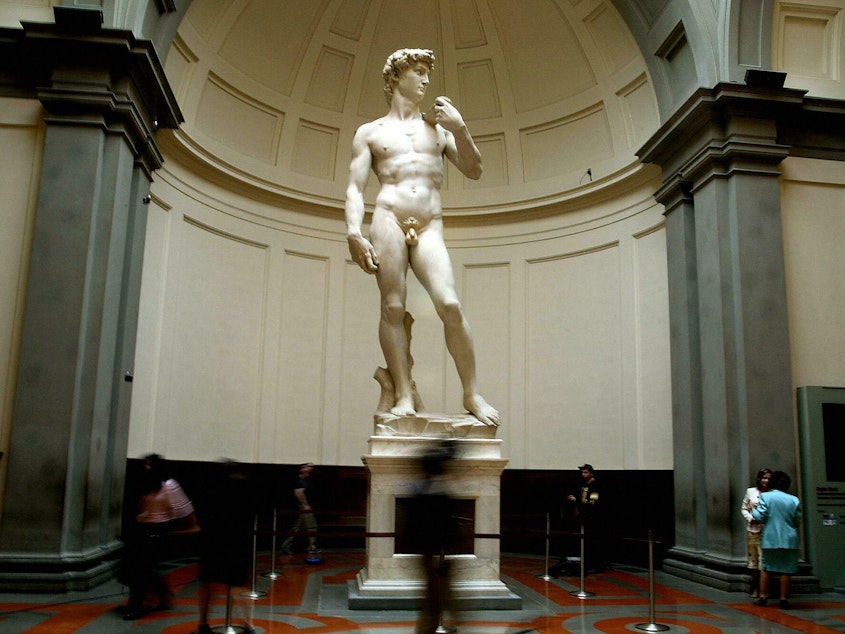 caption: Former Florida principal, Hope Carrasquilla, was personally invited to Florence, Italy to tour the 'David' statue last week.