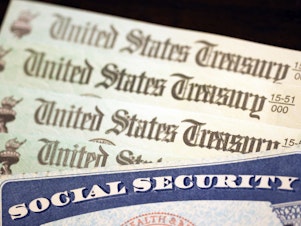 caption: Social Security's finances have improved slightly in the last year. But benefits are still facing an automatic cut in less than a decade unless Congress takes steps to prop up the program.