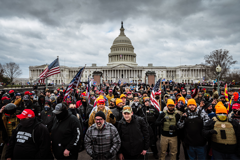 caption: Pro-Trump protesters gather in front of the U.S. Capitol Building on Jan. 6, 2021 in Washington, D,C. (Jon Cherry/Getty Images)