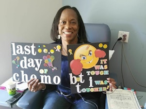 caption: Denise Lee on her last day of chemo. In addition to chemo and surgery, she was treated with immunotherapy. She's currently in remission.