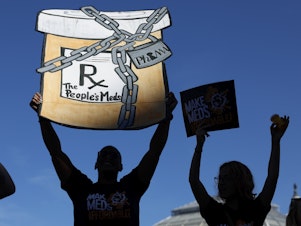 caption: Activists protest the prices of prescription drug outside the Department of Health and Human Services in Washington, D.C., in October 2022.