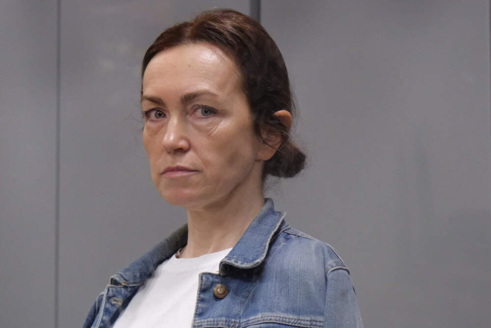 caption: Alsu Kurmasheva, an editor for the U.S. government-funded Radio Free Europe/Radio Liberty's Tatar-Bashkir service, attends a court hearing in Kazan, Russia on May 31, 2024. A Russian court has convicted Kurmasheva of spreading false information about the Russian army and sentenced her to 6½ years in prison after a secret trial, court records and officials said Monday July 22, 2024. (AP)