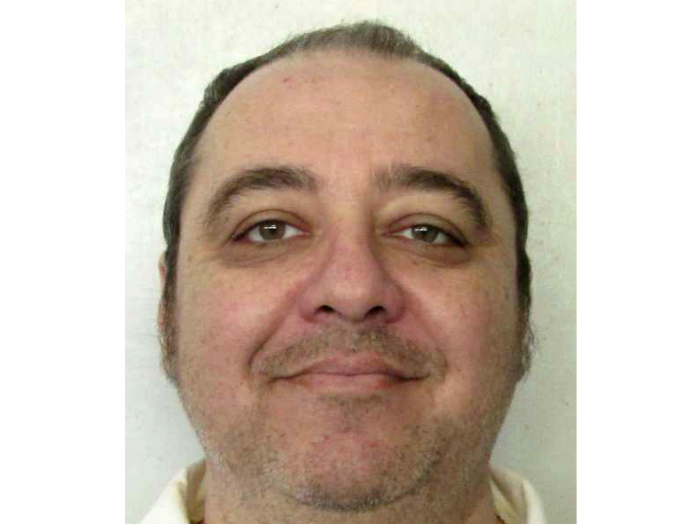 caption: This undated photo provided by Alabama Department of Corrections shows inmate Kenneth Eugene Smith, who was convicted in a 1988 murder-for-hire slaying of a preacher's wife. Alabama plans to put him to death by nitrogen hypoxia, an execution method that is authorized in three states but has never been used.