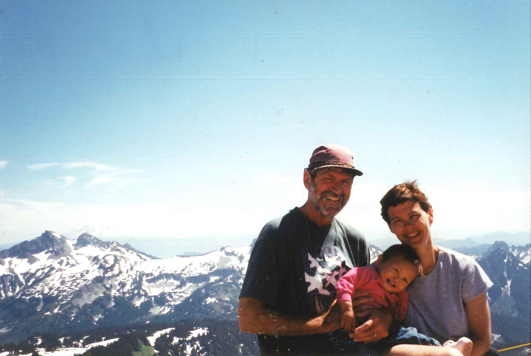 caption: Maya and her parents.