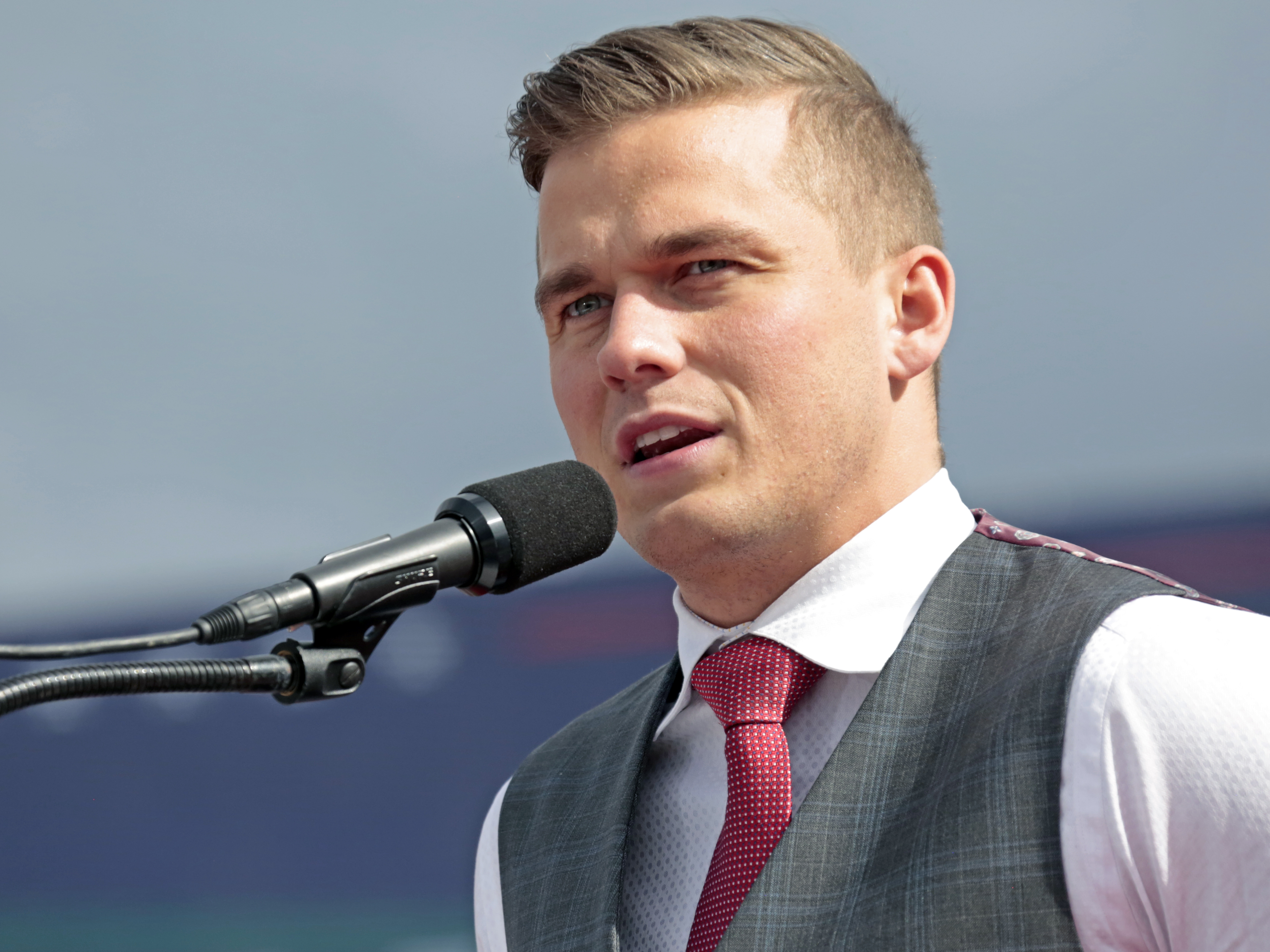 caption: Rep. Madison Cawthorn, R-N.C., speaks to the crowd before former President Trump takes the stage at a rally earlier this month, in Selma, N.C.