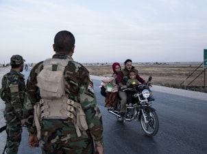 caption: Syrian government troops on Monday moved into towns in northern Syrian formerly controlled by U.S.-backed Kurdish militants. That sets up a potential clash with Turkish forces.