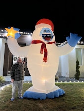 caption:  Steve Lee decided to bring holiday cheer to his neighborhood in Richland, Wash., by starting up an inflatable decorating competition with people in Madison, Wis.