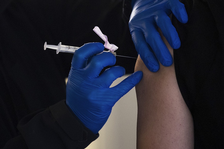 caption: The Seattle Fire Department has led vaccination efforts citywide; however, neither the fire nor police departments track Covid vaccinations among their employees.