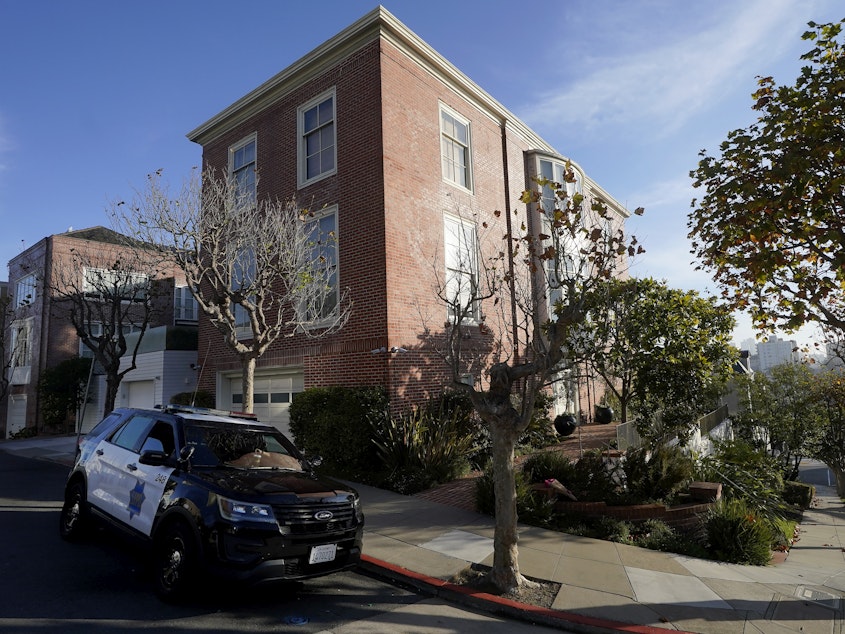 caption: A police vehicle parked outside the home of House Speaker Nancy Pelosi, in San Francisco, on Saturday. The accused assailant, David Wayne DePape, faces felony charges — assault and attempted kidnapping of an immediate family member of a U.S. official — which could land him in prison for a maximum of 50 years.