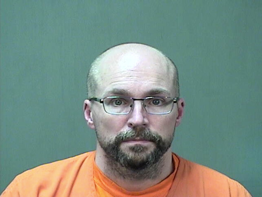 caption: Steven Brandenburg, the pharmacist accused of tampering with hundreds of doses of the Moderna COVID-19 vaccine, is facing a misdemeanor charge of attempted criminal damage to property.