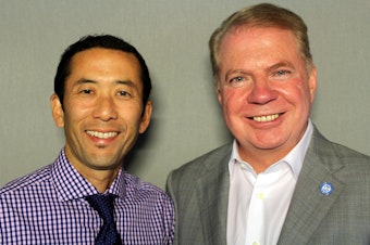 caption: Michael Shiosaki and Mayor Ed Murray at a 'StoryCorps' booth in Seattle.