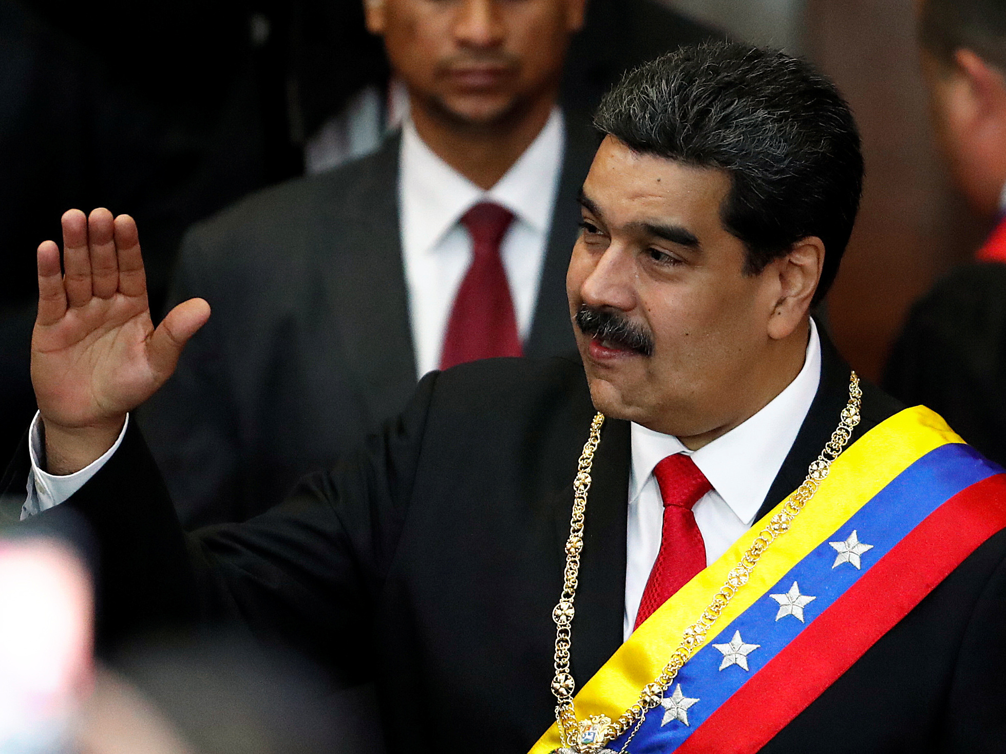 caption: Venezuela's sitting president, Nicolás Maduro, attends a ceremony Thursday in Caracas to mark the opening of the judicial year at the Supreme Court of Justice. Opposition leader Juan Guaidó has declared himself the interim president, but Maduro has not ceded power.