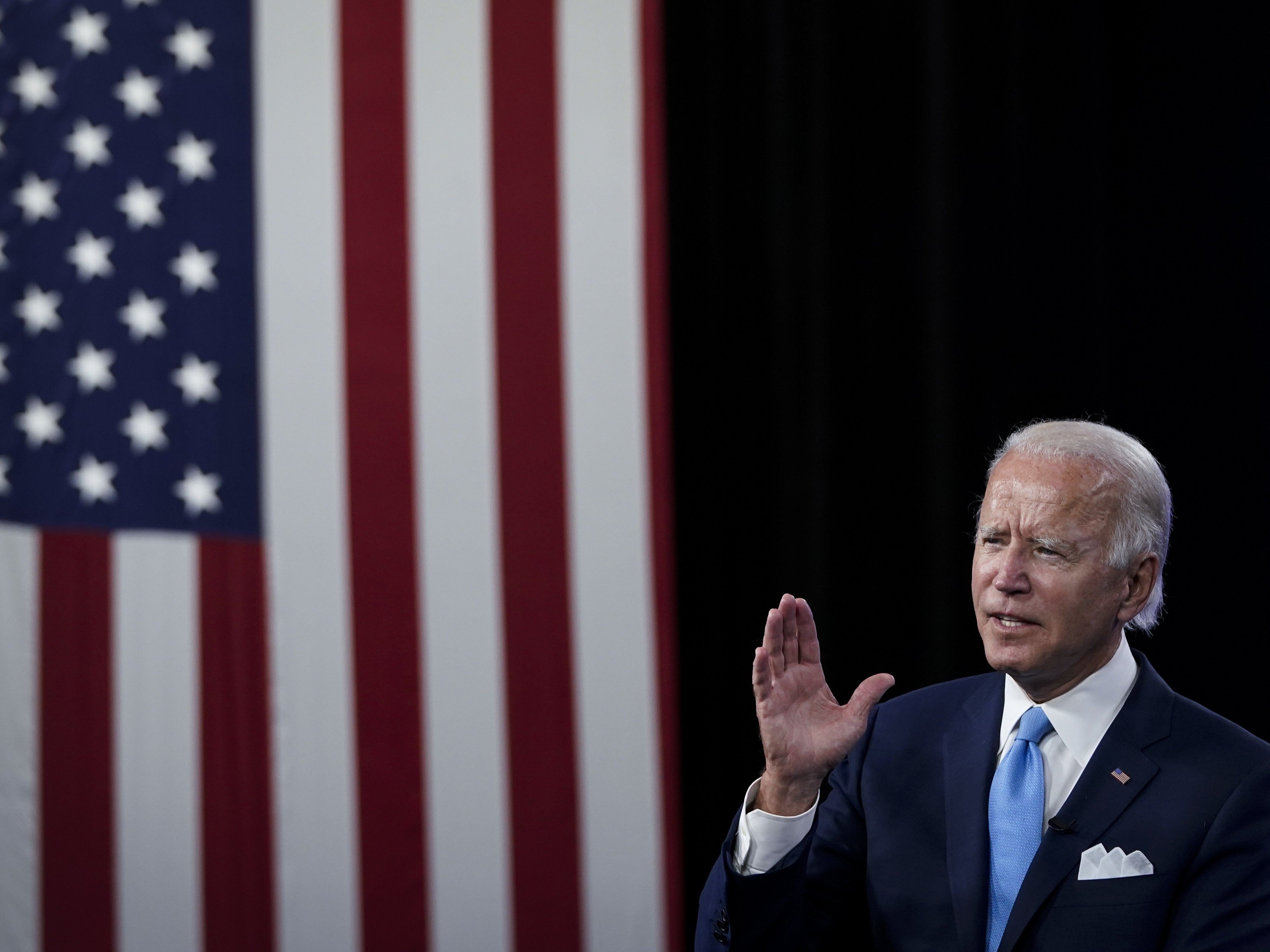 caption: Joe Biden addresses donors during a virtual fundraising event at the Hotel DuPont in Wilmington, Del., on Aug. 12. Biden will accept his party's nomination at this week's Democratic National Convention.