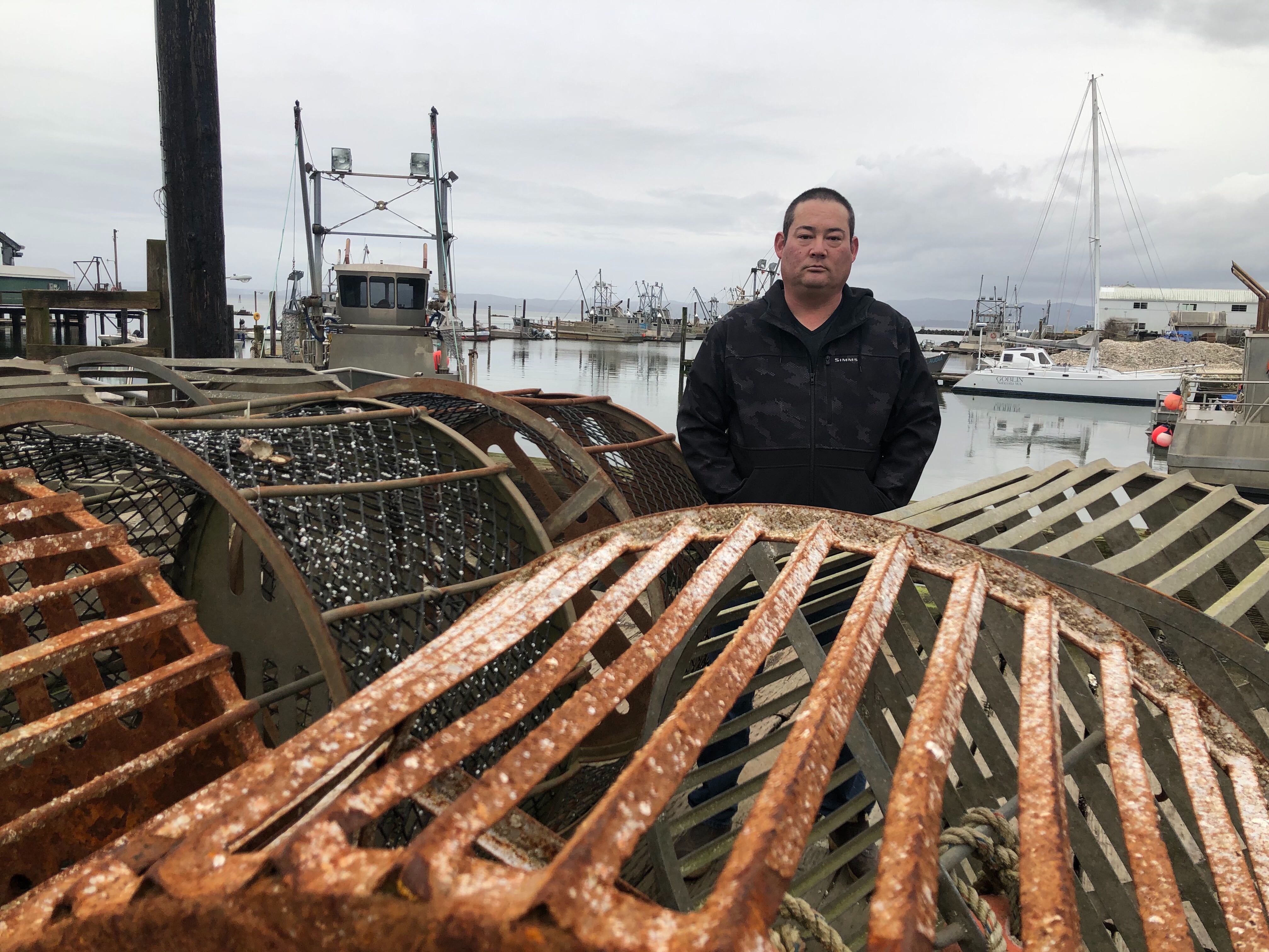 caption: Kenichi Wiegardt is a fifth-generation oyster grower. He's worried he'll be the last in his family if the coronavirus doesn't get better and trade doesn't pick up again to China and other Pacific Rim countries. Exports there make up the majority of his fresh-oyster packing business.
