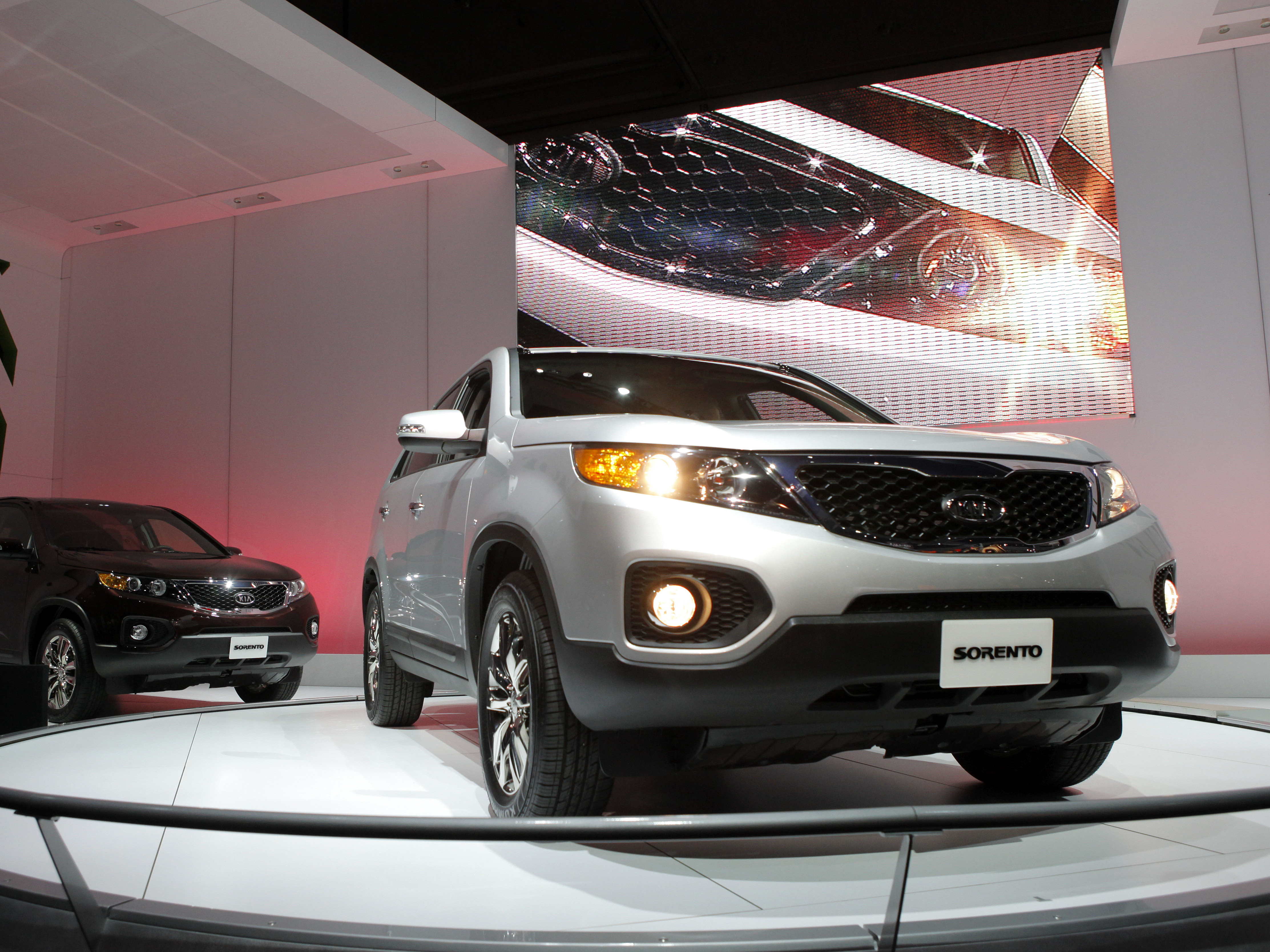 caption: Hyundai and Kia are recalling more than 3 million vehicles due to the risk of fire in the engine compartments. Twenty-three separate models are included in the recall, including the 2011 Kia Sorento, seen above at the Los Angeles Auto Show in 2009.