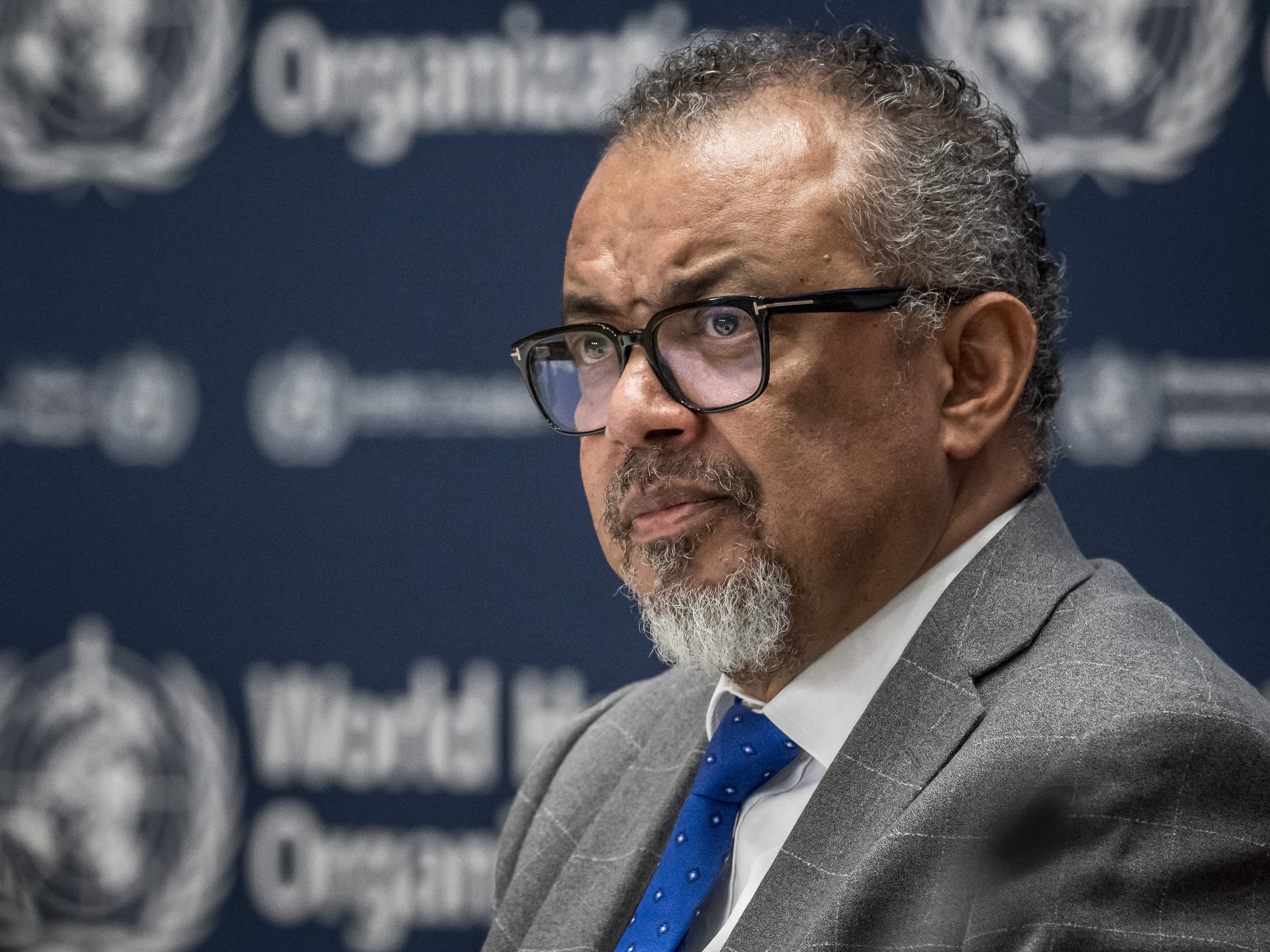 caption: WHO Director-General Tedros Adhanom Ghebreyesus looks on during a press conference with the Association of Accredited Correspondents at the United Nations (ACANU) at the World Health Organization's headquarters in Geneva, on December 10, 2024.